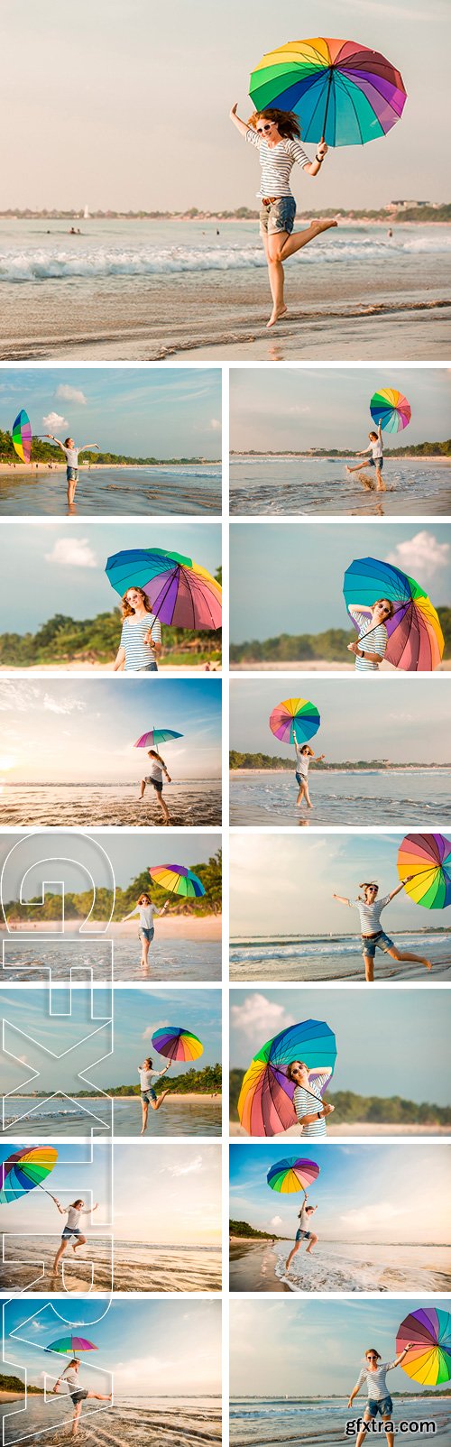Stock Photos - Cheerful caucasian young woman with rainbow umbrella having fun on the Jimbaran beach on Bali before sunset with beautiful ocean and blue sky on background