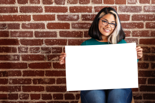 Hispanic girl showing an empty paper transparent png - 2032063