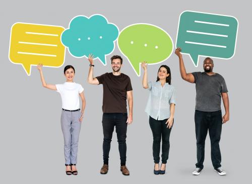 People holding colorful speech bubbles - 492712
