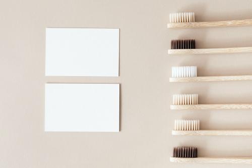Bamboo toothbrushes and white blank cards - 2258638
