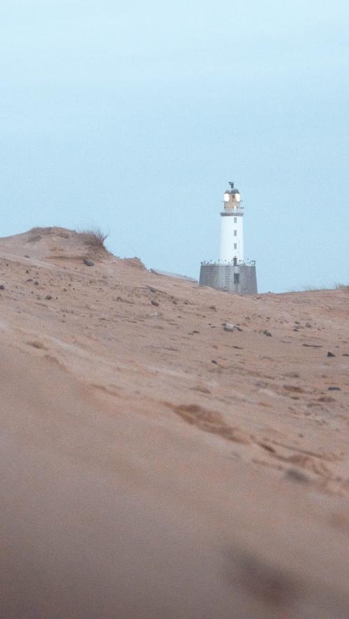 Rattray Head lighthouse at Aberdeenshire coast, Scotland - 1230632