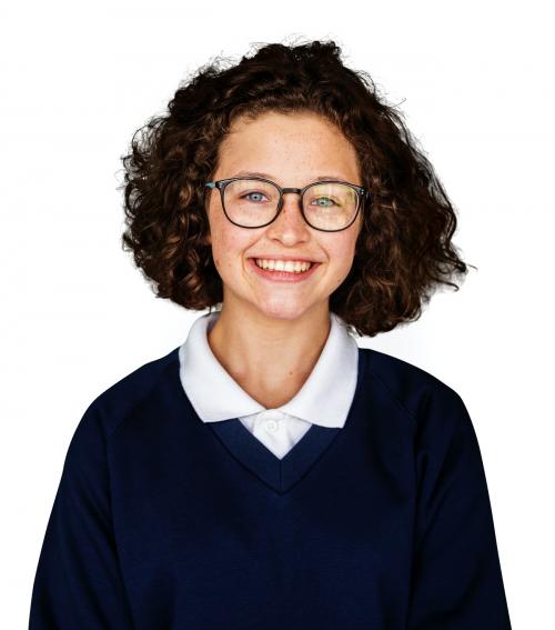 Portrait studio shoot of schoolgirl in uniform with smiling - 7649