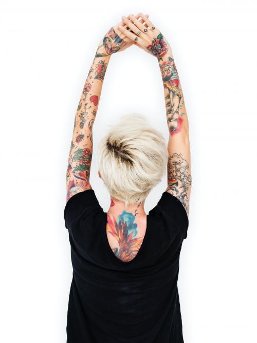 Caucasian tattooed woman stretching - 6581