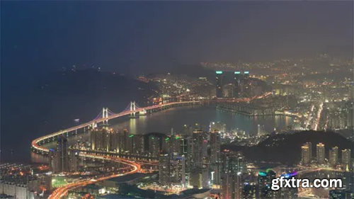 Videohive The Gwangandaegyo or Diamond Bridge from day to night as seen from the hill 23229314