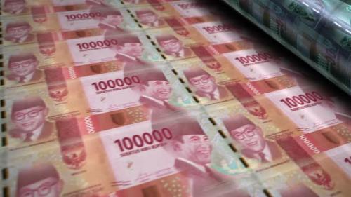 Videohive - Indonesian Rupiah money banknotes printing seamless loop - 33063548