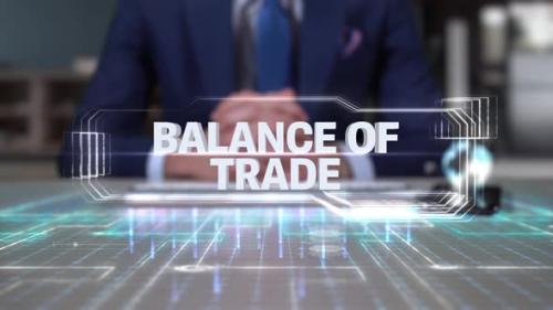 Videohive - Businessman Writing On Hologram Table Economics Word Balance Of Trade - 35164895