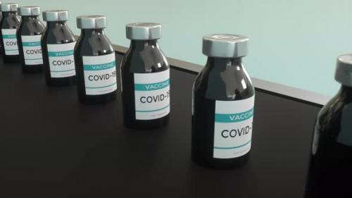 Videohive - Covid19 Vaccine Manufacturingbottles Vials Passing on Conveyor Belt - 35368501