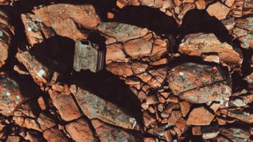 Videohive - Old Rusty Metal Canister for Gasoline Fuel at Rocks - 36782135