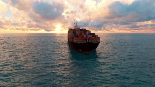 Videohive - Container Ship In The Ocean At Sunset Sky - 47519202