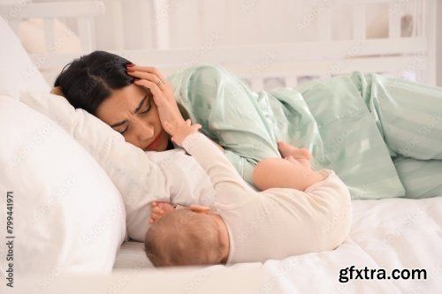 Young Woman With Her Baby Suffering From Postnatal Depression 6xJPEG