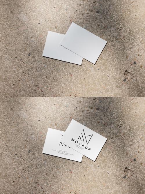 Two Horizontal Business Card Mockup on a Concrete Background With Sun Light