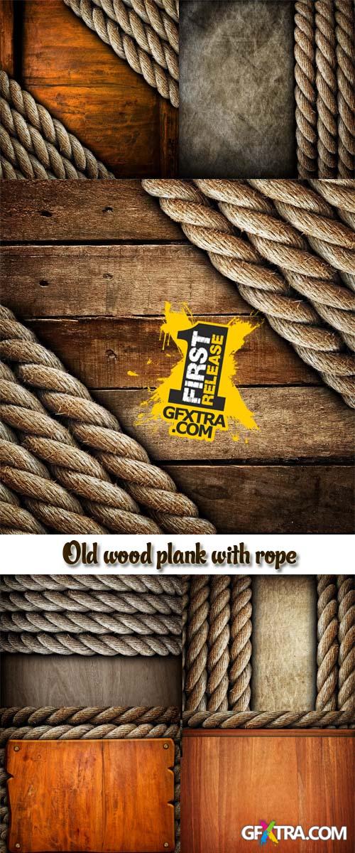 Stock Photo: Old wood plank with rope
