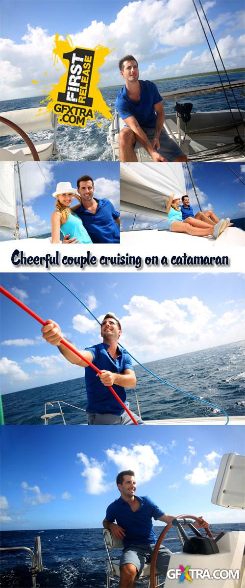 Stock Photo: Cheerful couple cruising on a catamaran in Caribbean sea