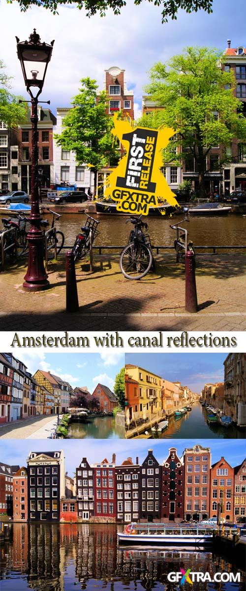 Stock Photo: Traditional houses of Amsterdam with canal reflections