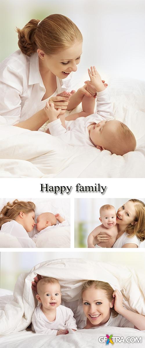 Stock Photo: Happy family, young mother with baby