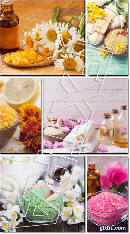 Spa setting. Sea salt and oil with flowers - Stock photo