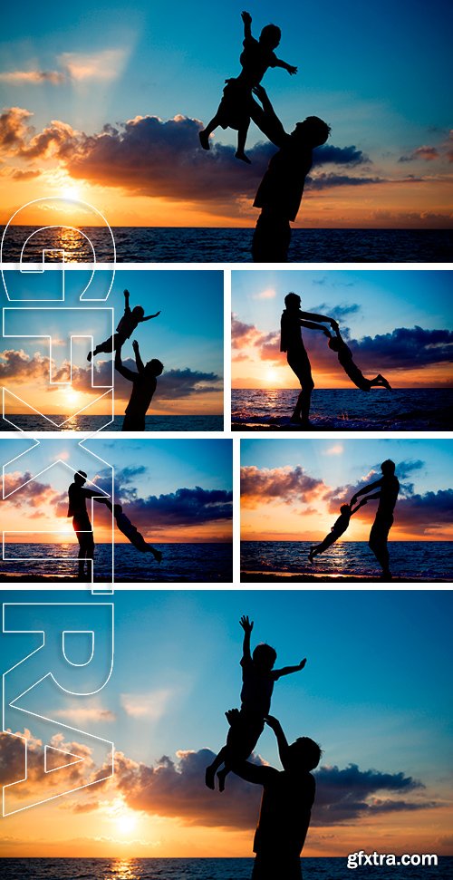 Stock Photos - Father and son silhouettes play at sunset beach