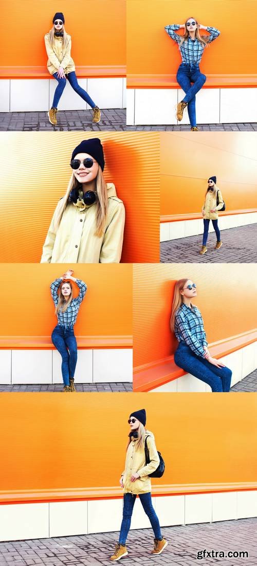 Fashion Pretty Blonde Girl Posing Over Colorful Orange Background