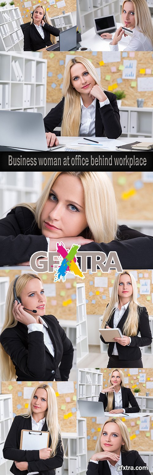 Business woman at office behind workplace