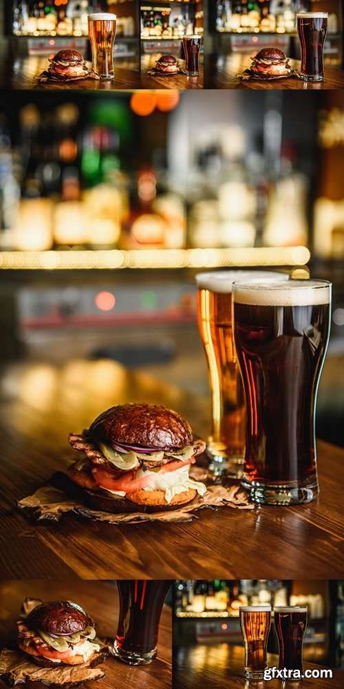 Hamburger and dark beer on a pub background