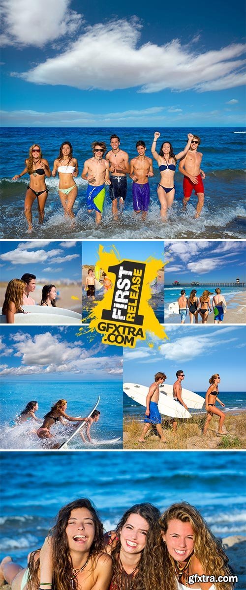 Stock Image Teenager surfers group running beach splashing