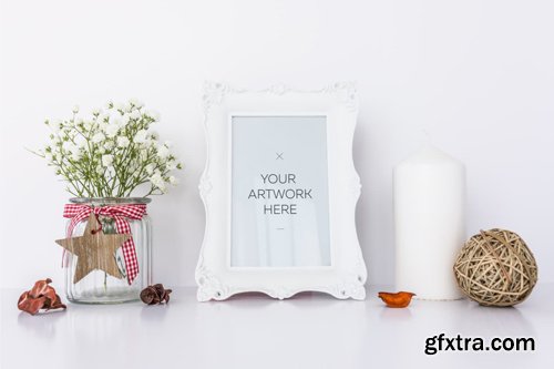 White Frame Mockup With Candle & Flowers