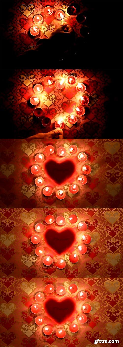 Burning candles in form of heart