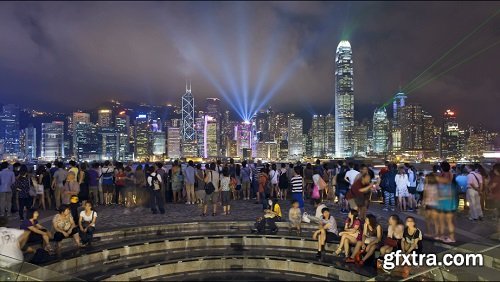People watching the world famous sound and light show hong kong city skylin