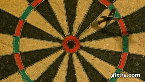 Slow motion dart hitting dartboard