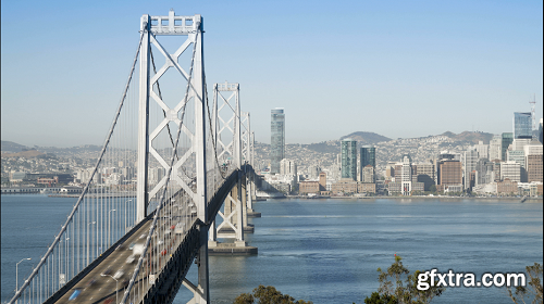 Time lapse of the san francisco bay bridge and city skyline viewed from tre