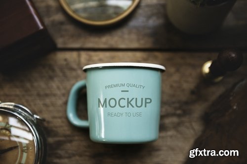 Aerial view of mockup blue cup on wooden table