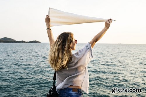 Woman Relaxing And Holding White Flag Mockup