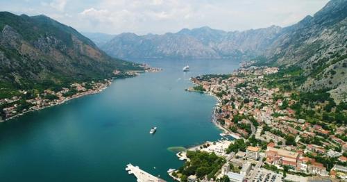Aerial Beautiful View of Kotor Bay. Cruise Ship Docked in Beautiful Summer Day
