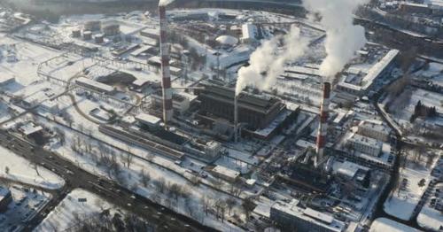 Factory polluting air during winter