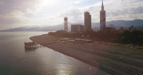 Light Haze Surrounding Batumi Seafront with Buildings at Back, Late Afternoon