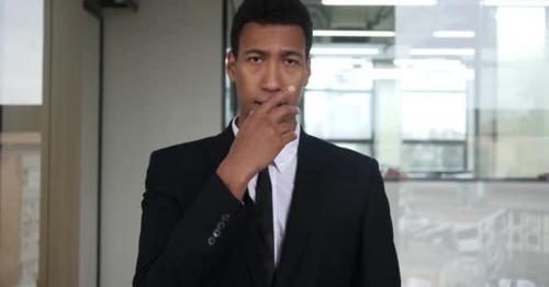 Amazed Black Businessman in Suit, Surprised Gesture