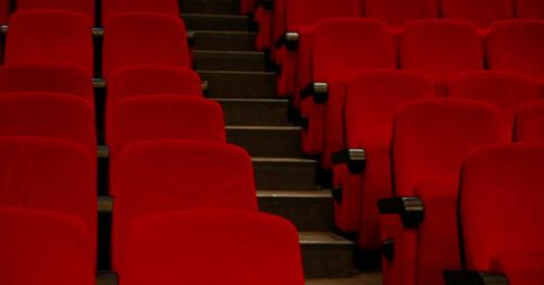 Empty Auditorium - Red Chairs In Rows