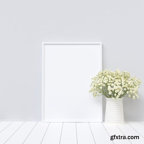 Poster mockup on white interior with plant decoration Premium Photo