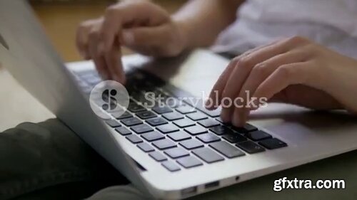 Videoblocks - Close-up of female hands typing on the laptop keyboard | After Effects