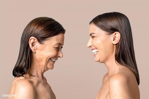Mother and daughter having fun against a wall mockup - 2253797