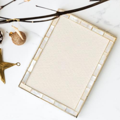 Festive picture frame on a table - 1231348