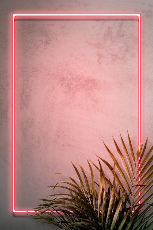 Pink neon frame on a wall with tropical plants mockup design - 1223384