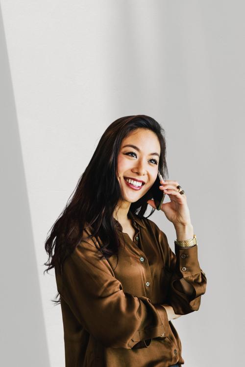 Young happy woman on the phone - 1226567