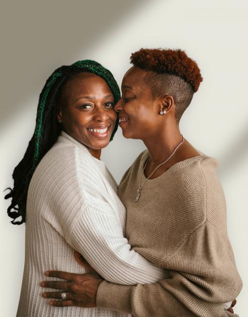 Happy lesbian couple hugging each other - 1205368