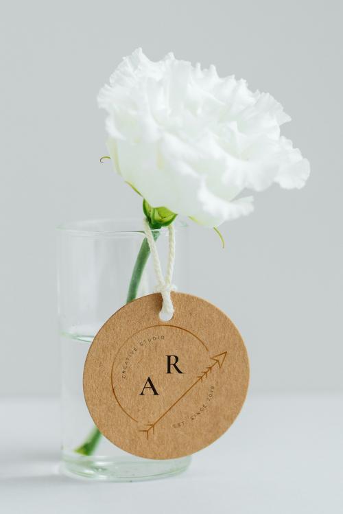 White peony in a cleared vase with a tag mockup - 1209206