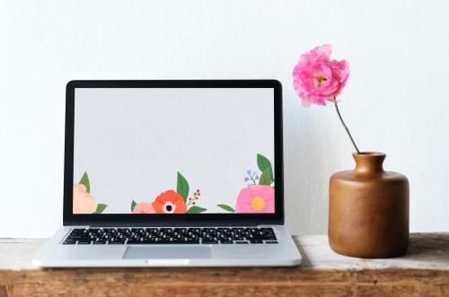 Blank laptop screen mockup by a pink peony - 1210016