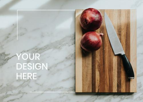 Frame mockup with an onion on a cutting board - 1211415