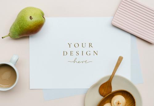 White card mockup on a pastel pink table - 1215135