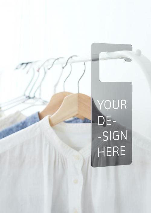 Shirt on a clothing rack with a tag mockup - 1215332