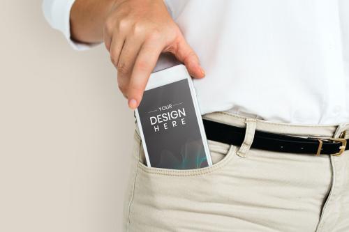 Man getting his phone from his pants pocket with screen mockup - 844061